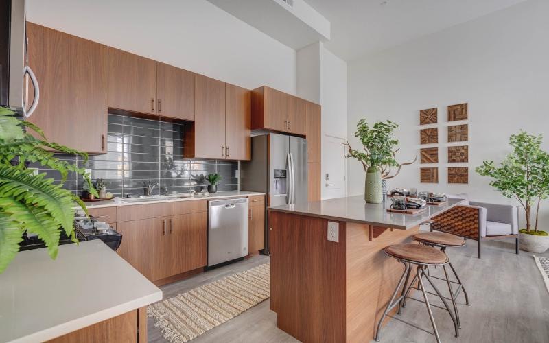 a kitchen with wooden cabinets