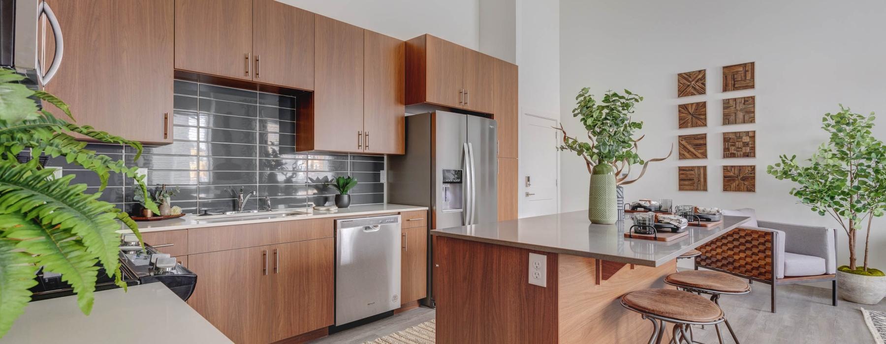 a kitchen with wooden cabinets